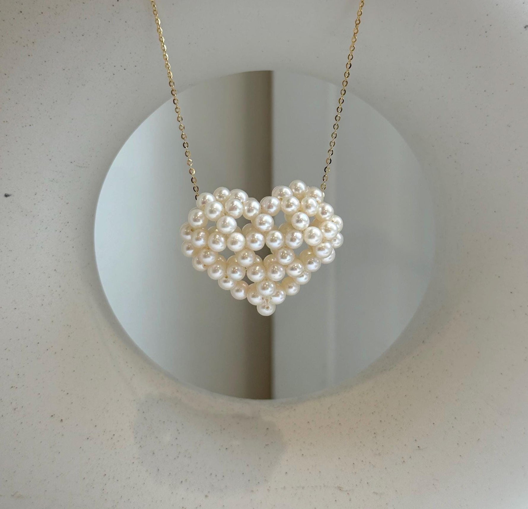 Elly’s 3D Heart white small pearls pendant: Extreme luster mirrored, 3.9-4.5mm, 3.5x3cm, S925 silver chain set. Pearl jewelry idea.