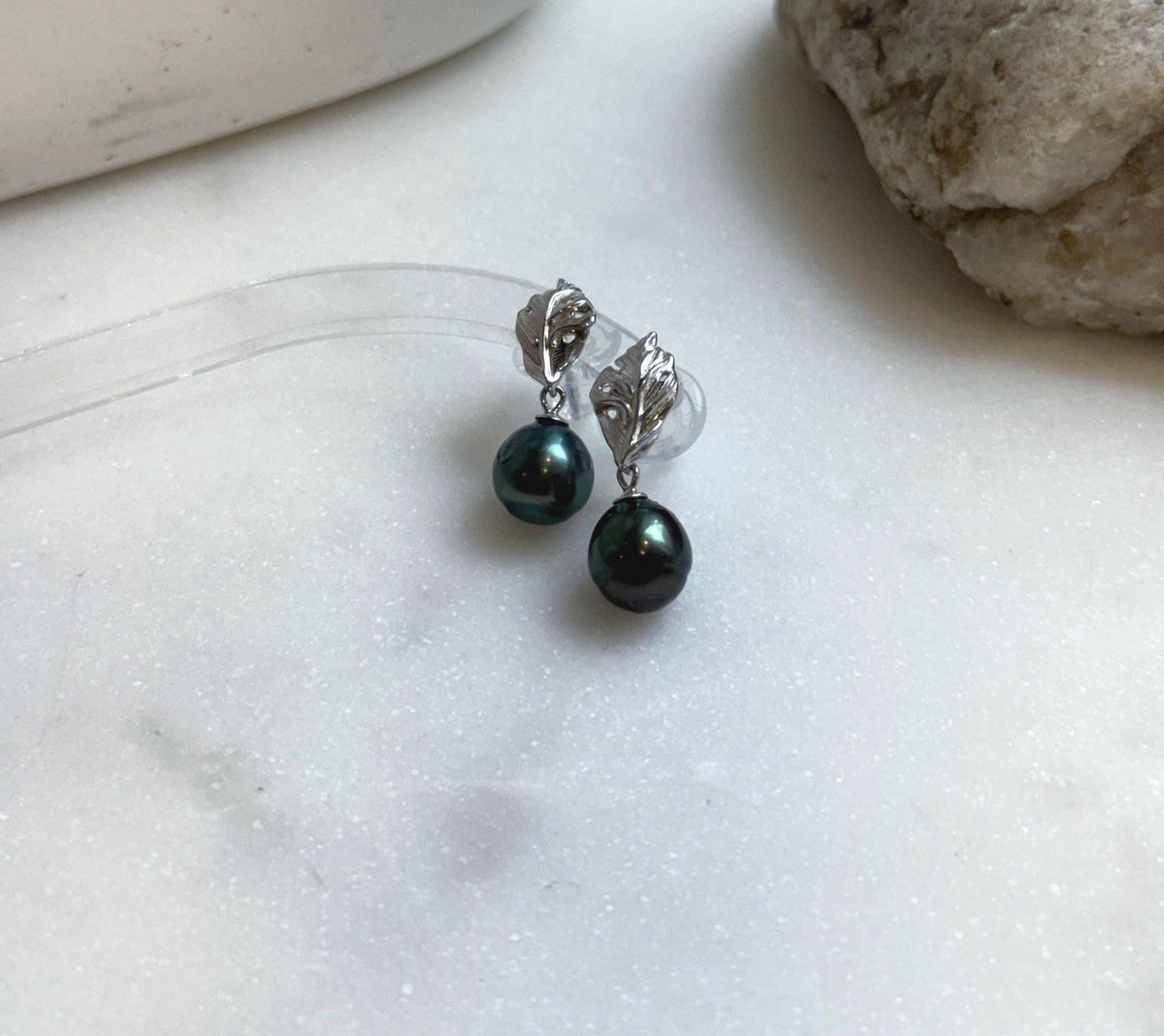 Elly’s 8.7mm Tahitian Peacock green ocean pearls leaf earrings: Extreme luster mirrored, 2.4cm high, silver earrings. Pearl jewelry idea.