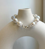 Elly’s 12pcs Australian Ocean white silver Pearls Bracelet: Extreme luster mirrored, to 18.2mm, 8.4” knotted, S925 silver clip.