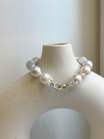 Elly’s 12pcs Australian Ocean white silver Pearls Bracelet: Extreme luster mirrored, to 18.2mm, 8.4” knotted, S925 silver clip.