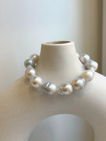 Elly’s 12pcs Australian Ocean white silver Pearls Bracelet: Extreme luster mirrored, to 18.2mm, 8.4” knotted, S925 silver clip.