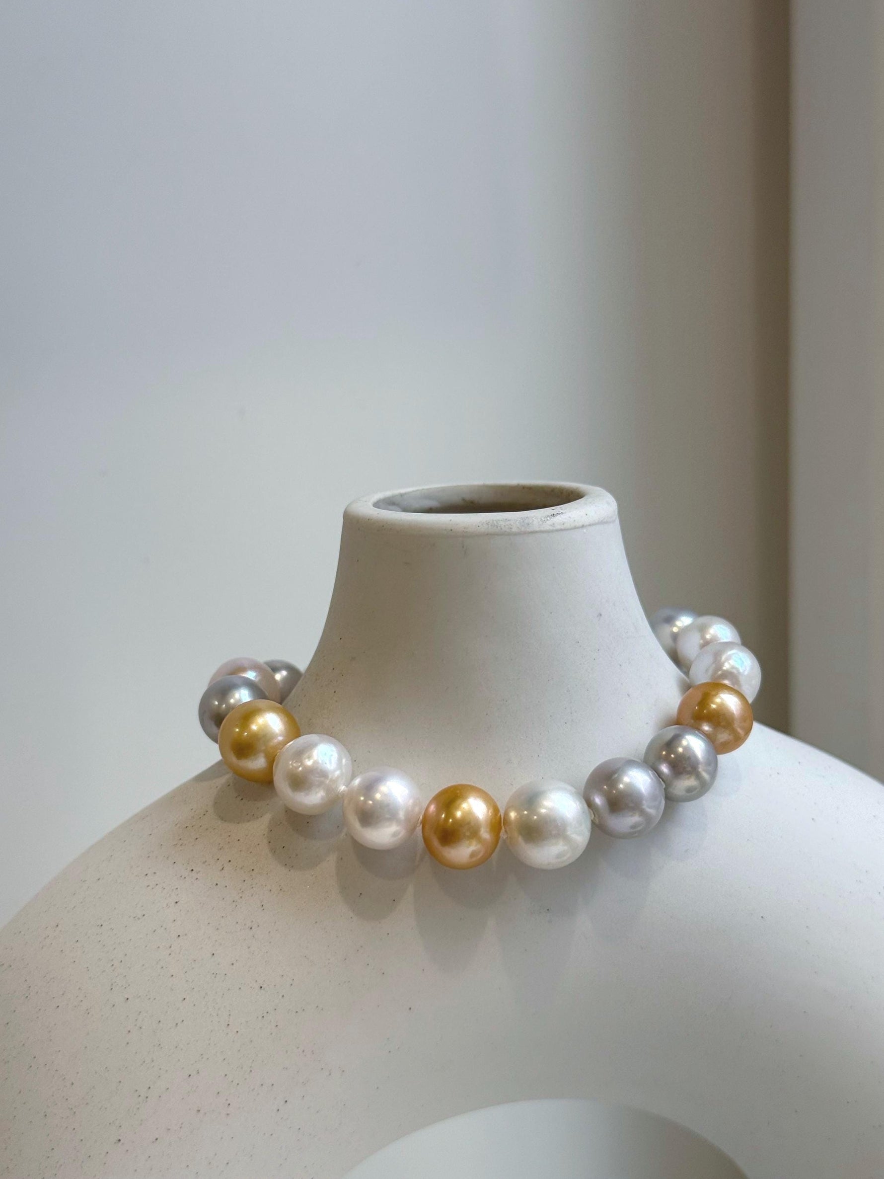 Elly’s 18pcs 8.3-10.5mm White gold silver Edison Pearls Bracelet: Extreme luster mirrored, 7.6” knotted, S925 silver Bracelet.
