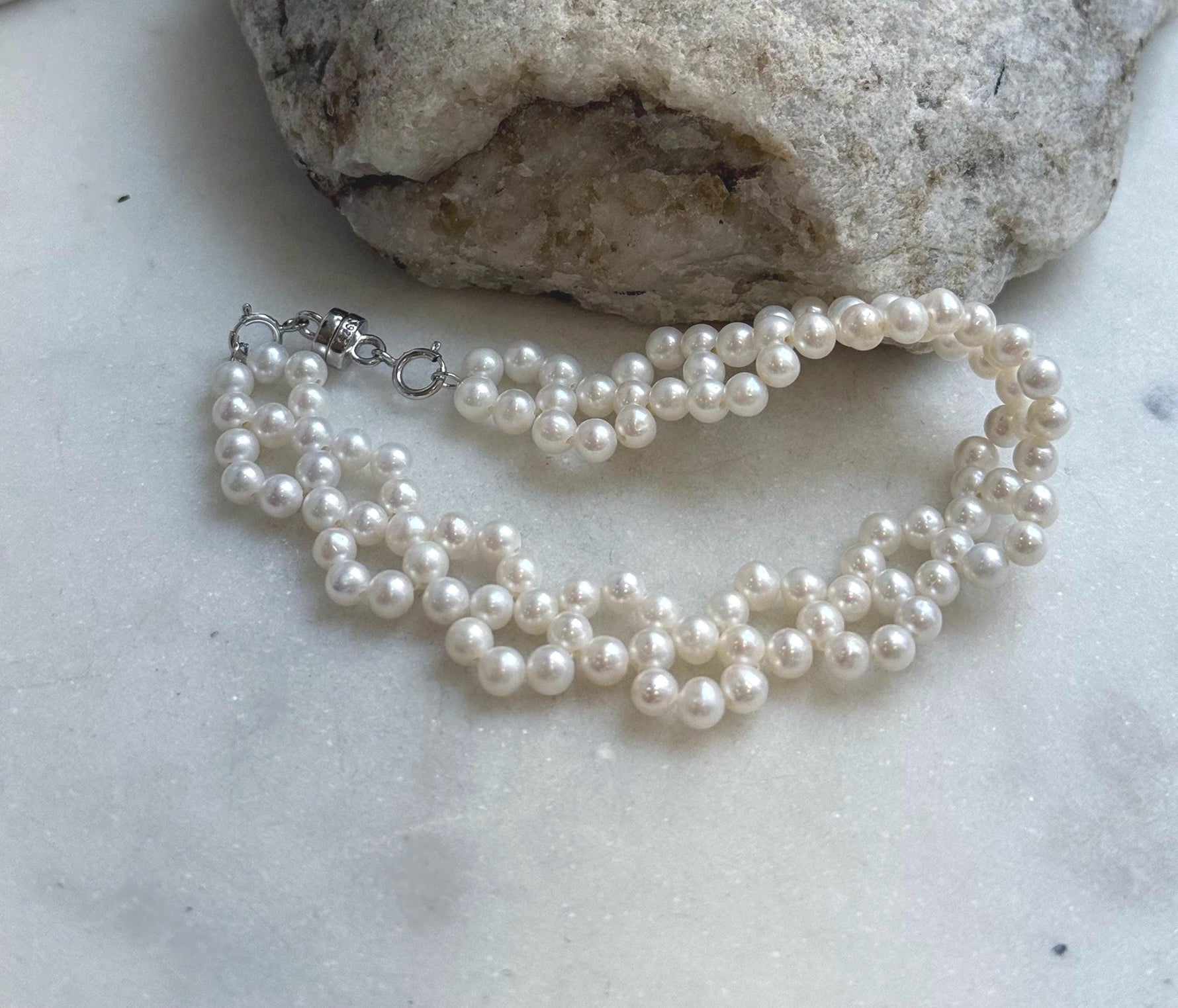 Elly’s 3-ply 4-4.5mm white pearls bracelet: Extreme luster, Handmade braided, 6.9”, S925 silver magnetic clips bracelet. daily office pearl bracelet