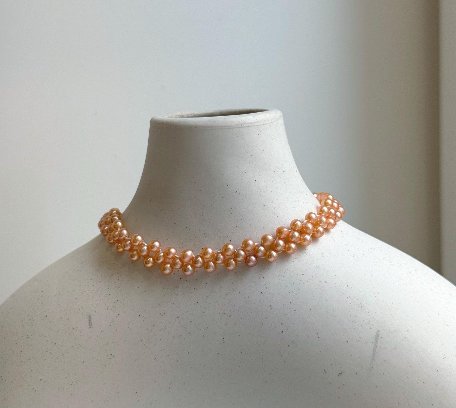 Elly’s 3-ply 3-3.5mm peach pearls bracelet: Extreme luster, Handmade braided, 6.9”, S925 silver magnetic clips bracelet.