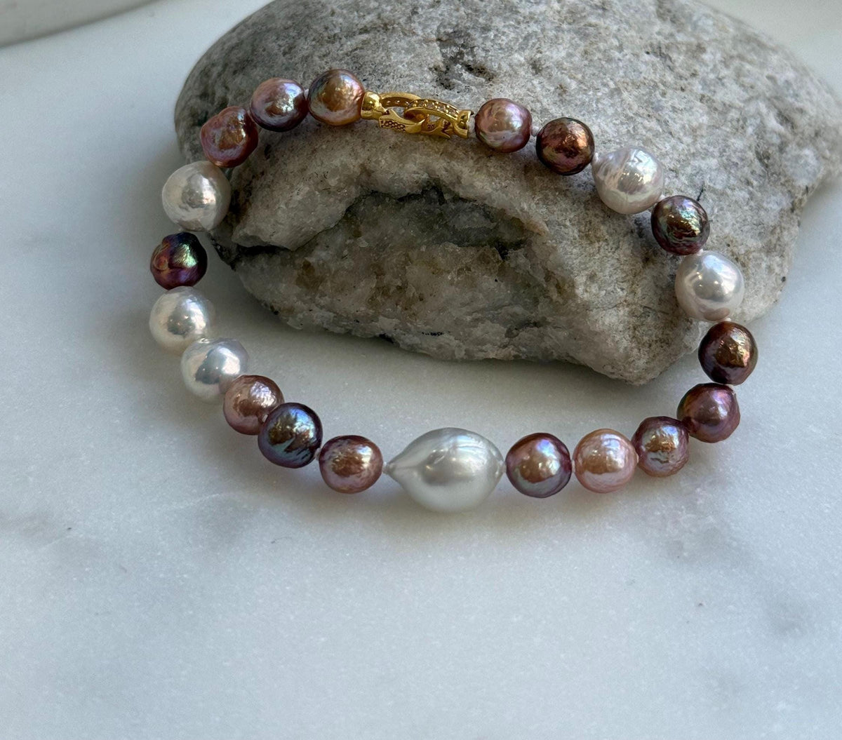 Elly’s Metallic pink rose gold pearls Bracelet: Extreme luster mirrored, 8” knotted, S925 silver Braclet. Pearl jewelry idea