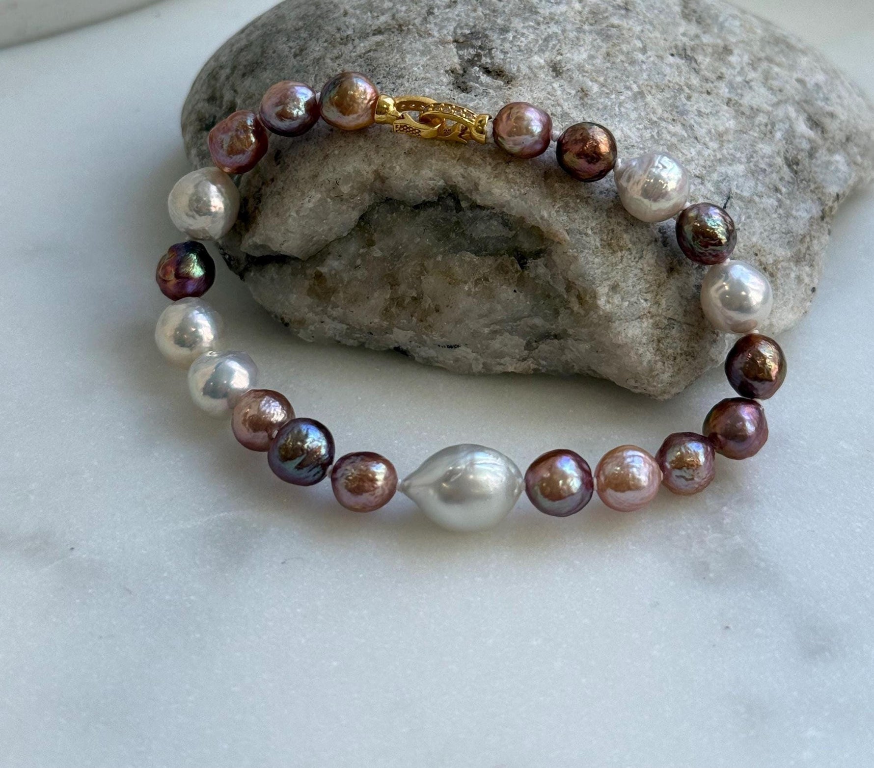 Elly’s Metallic pink rose gold pearls Bracelet: Extreme luster mirrored, 8” knotted, S925 silver Braclet. Pearl jewelry idea