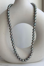 Elly’s 7-7.5mm 57pcs Akoya peacock green ocean pearls necklace:Extreme luster mirrored, knotted, 18.1”, S925 silver necklace strand. gift for her holiday