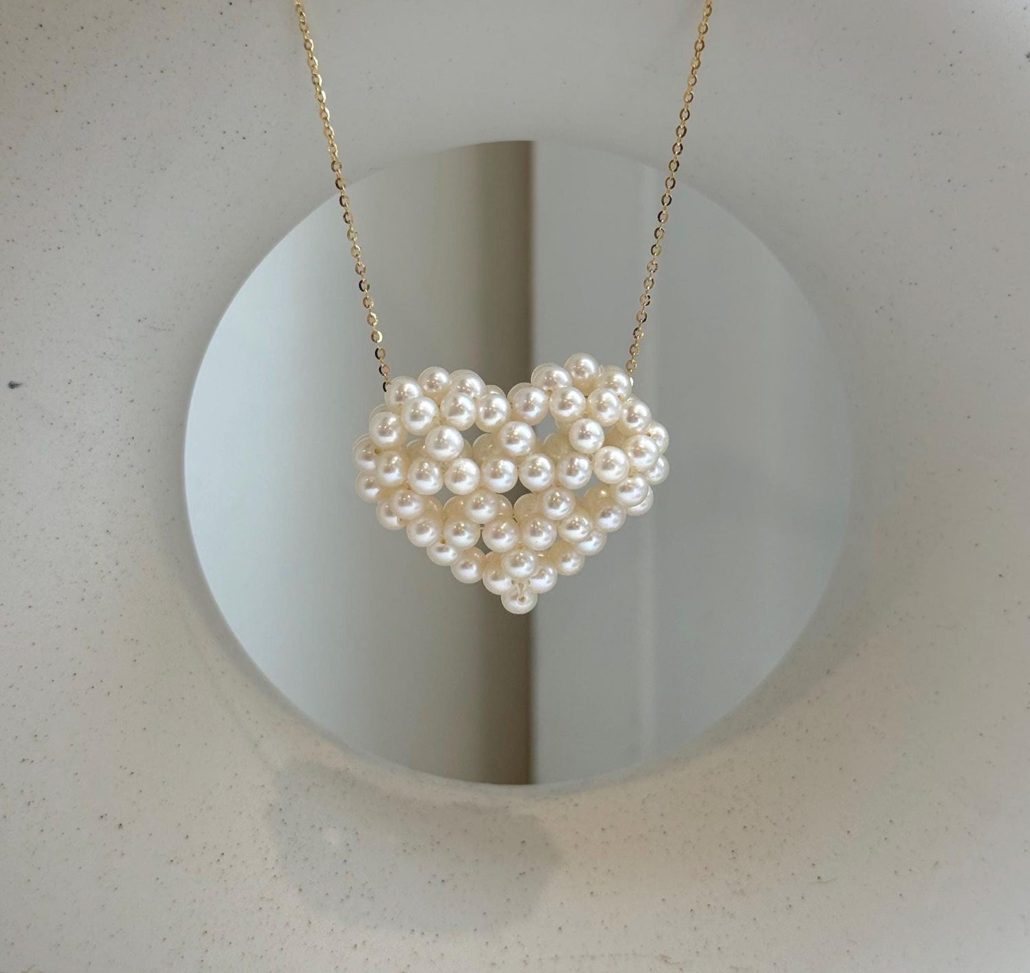 Elly’s 3D Heart white small pearls pendant: Extreme luster mirrored, 3.9-4.5mm, 3.5x3cm, S925 silver chain set. Pearl jewelry idea.