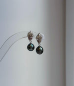 Elly’s 8.7mm Tahitian Peacock green ocean pearls leaf earrings: Extreme luster mirrored, 2.4cm high, silver earrings. Pearl jewelry idea.