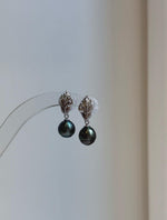 Elly’s 8.7mm Tahitian Peacock green ocean pearls leaf earrings: Extreme luster mirrored, 2.4cm high, silver earrings. Pearl jewelry idea.