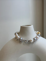 Elly’s 18pcs 8.3-10.5mm White gold silver Edison Pearls Bracelet: Extreme luster mirrored, 7.6” knotted, S925 silver Bracelet.