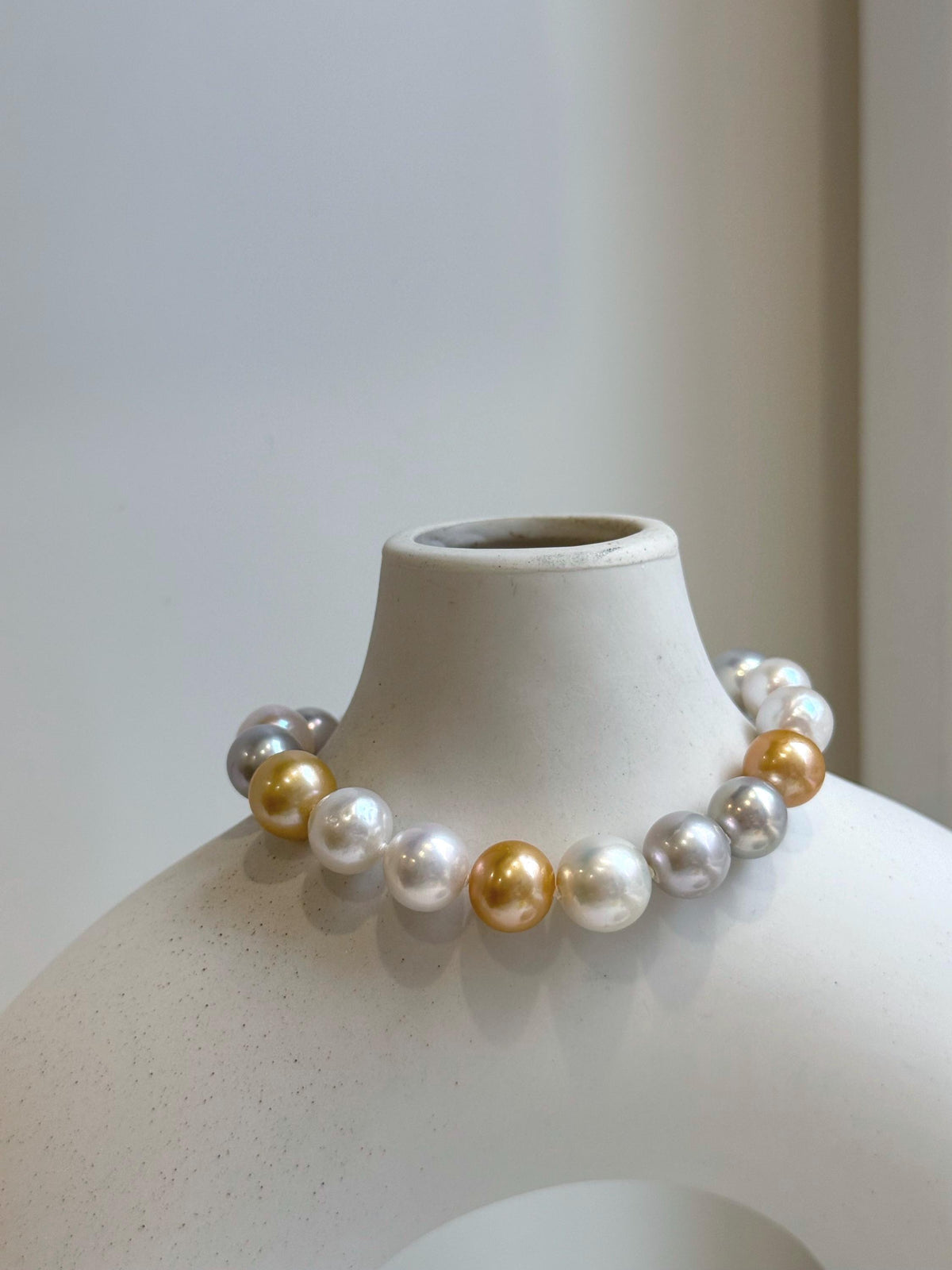 Elly’s 18pcs 8.3-10.5mm White gold silver Edison Pearls Bracelet: Extreme luster mirrored, 7.6” knotted, S925 silver Bracelet.