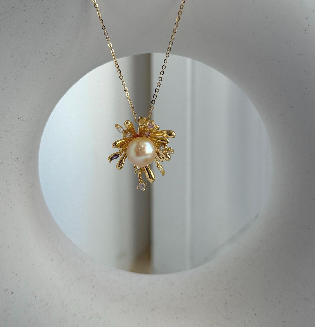 Elly’s 8.8mm South sea gold iridescent Pearl Fireworks Pendant: Extreme luster mirrored, 2.3cm high, S925 silver Pendant with silver chain.