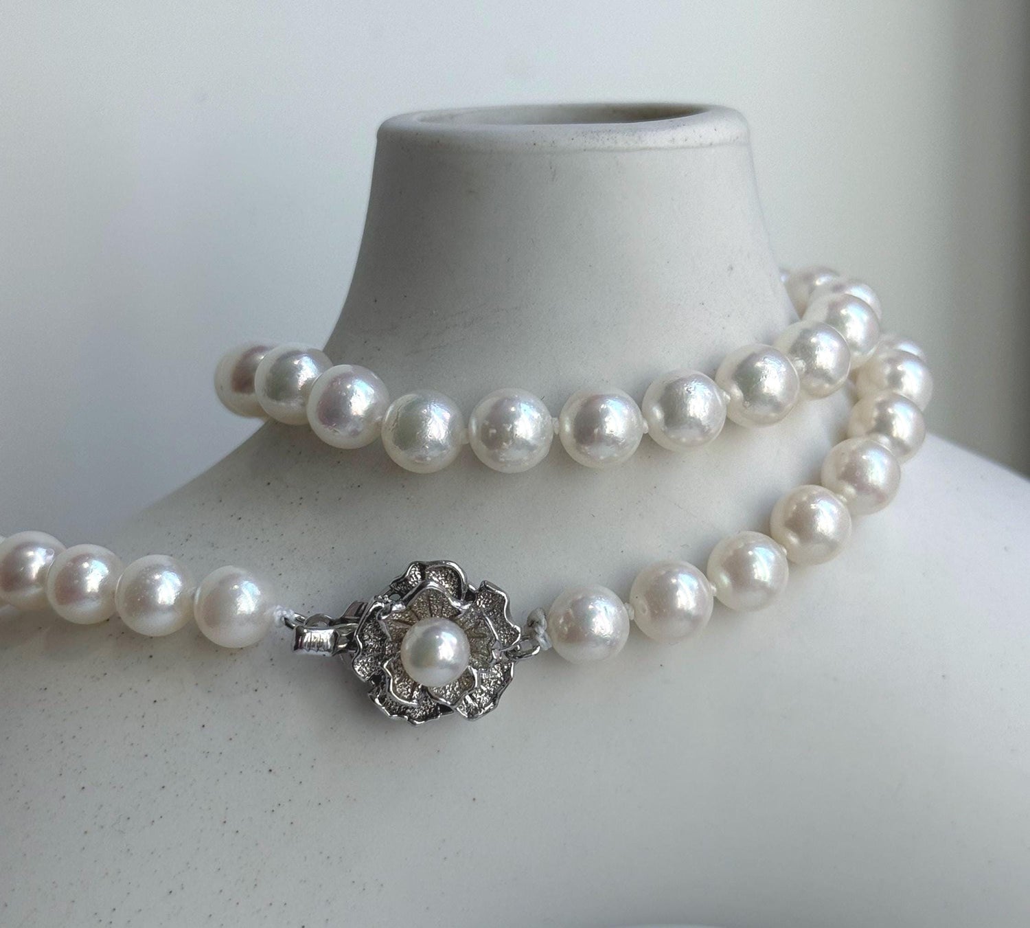 Elly’s 7.1-7.5mm 58pcs Akoya off white ocean pearls necklace:Extreme luster mirrored, knotted, 18.3”, S925 silver necklace strand.