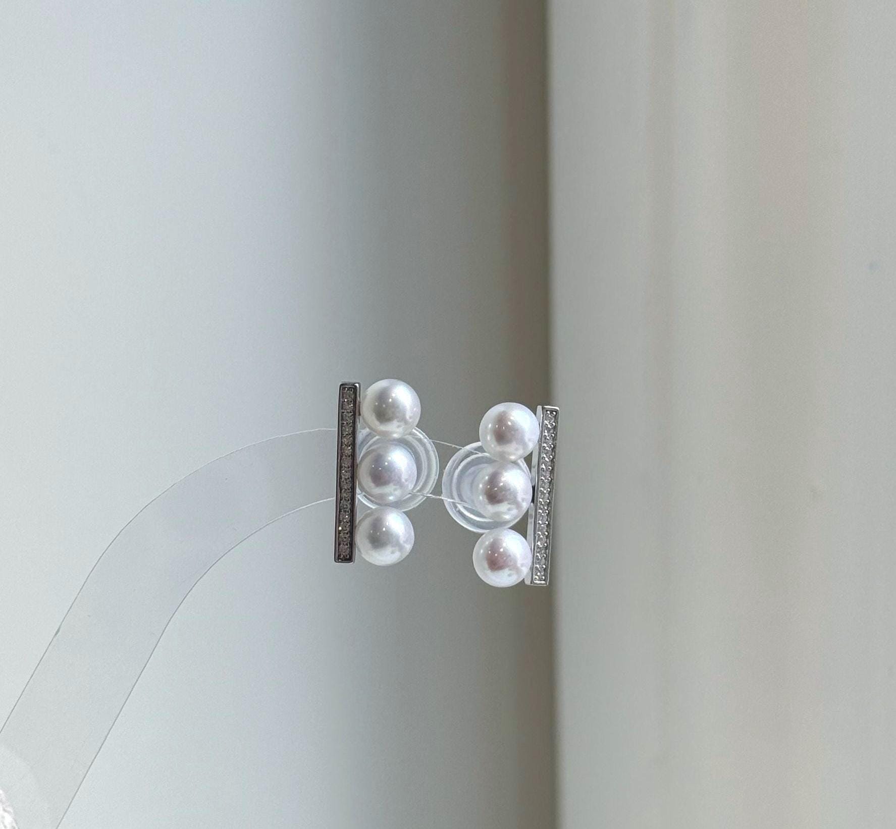 Elly’s 6pcs 6-6.2mm White Pearls Earrings: Extreme luster Mirrored, S925 silver earrings studs. Gift for her anniversary