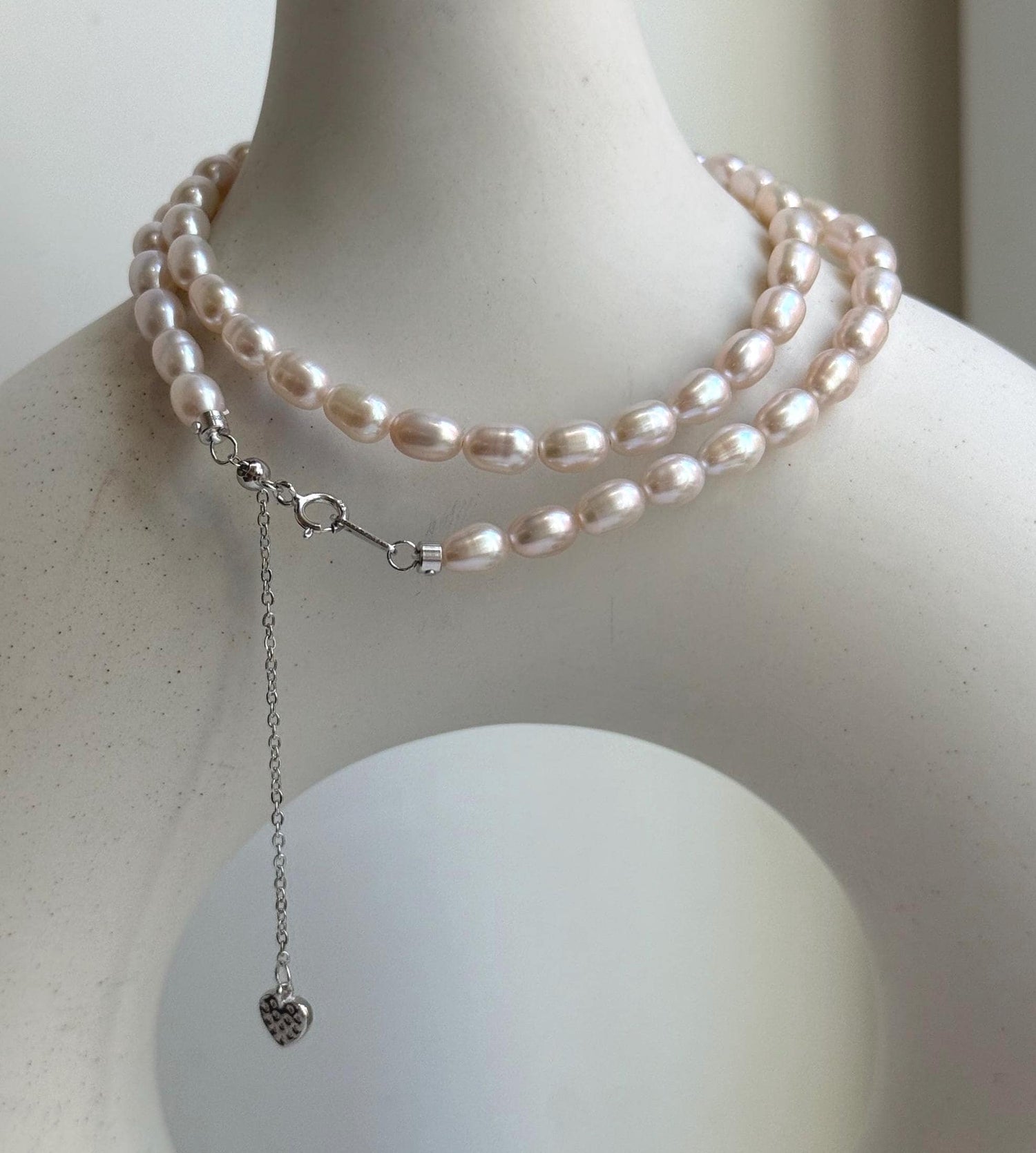 Elly’s 4.5-5mm Akoya ivory rice Keshi pearls necklace:Extreme luster mirrored, to 17.9”, S925 silver necklace strand.