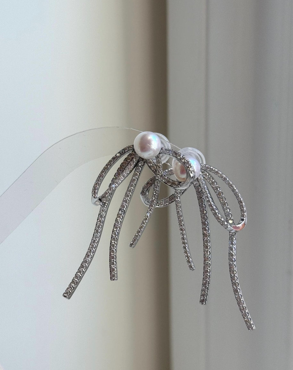 Elly’s 7.7mm white pearls butterfly bow earrings: Extreme luster mirrored, 3x5cm, S925 silver studs copper earrings. Pearl jewelry.