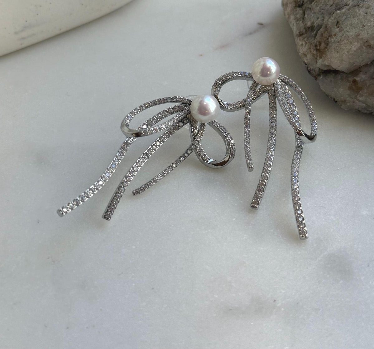 Elly’s 7.7mm white pearls butterfly bow earrings: Extreme luster mirrored, 3x5cm, S925 silver studs copper earrings. Pearl jewelry.gift for her