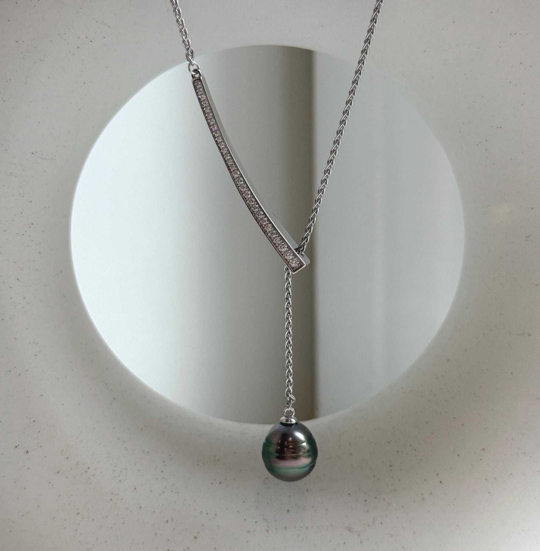 Elly’s 10.2mm Genius Tahitian peacock green ocean pearl Pendant: Extreme luster mirrored, to 20”, s925 silver minimalist pendant chain set.