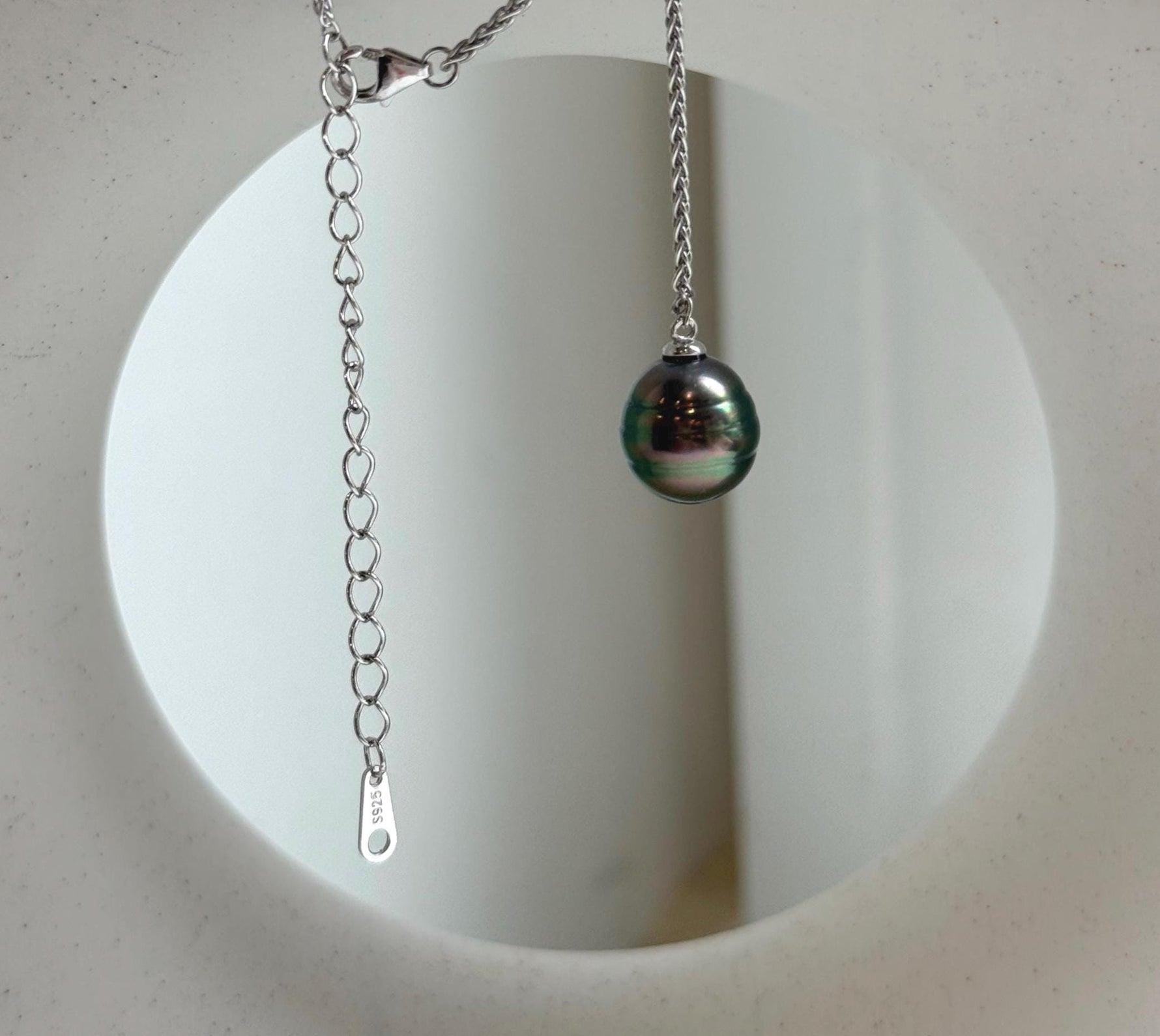 Elly’s 10.2mm Genius Tahitian peacock green ocean pearl Pendant: Extreme luster mirrored, to 20”, s925 silver minimalist pendant chain set.