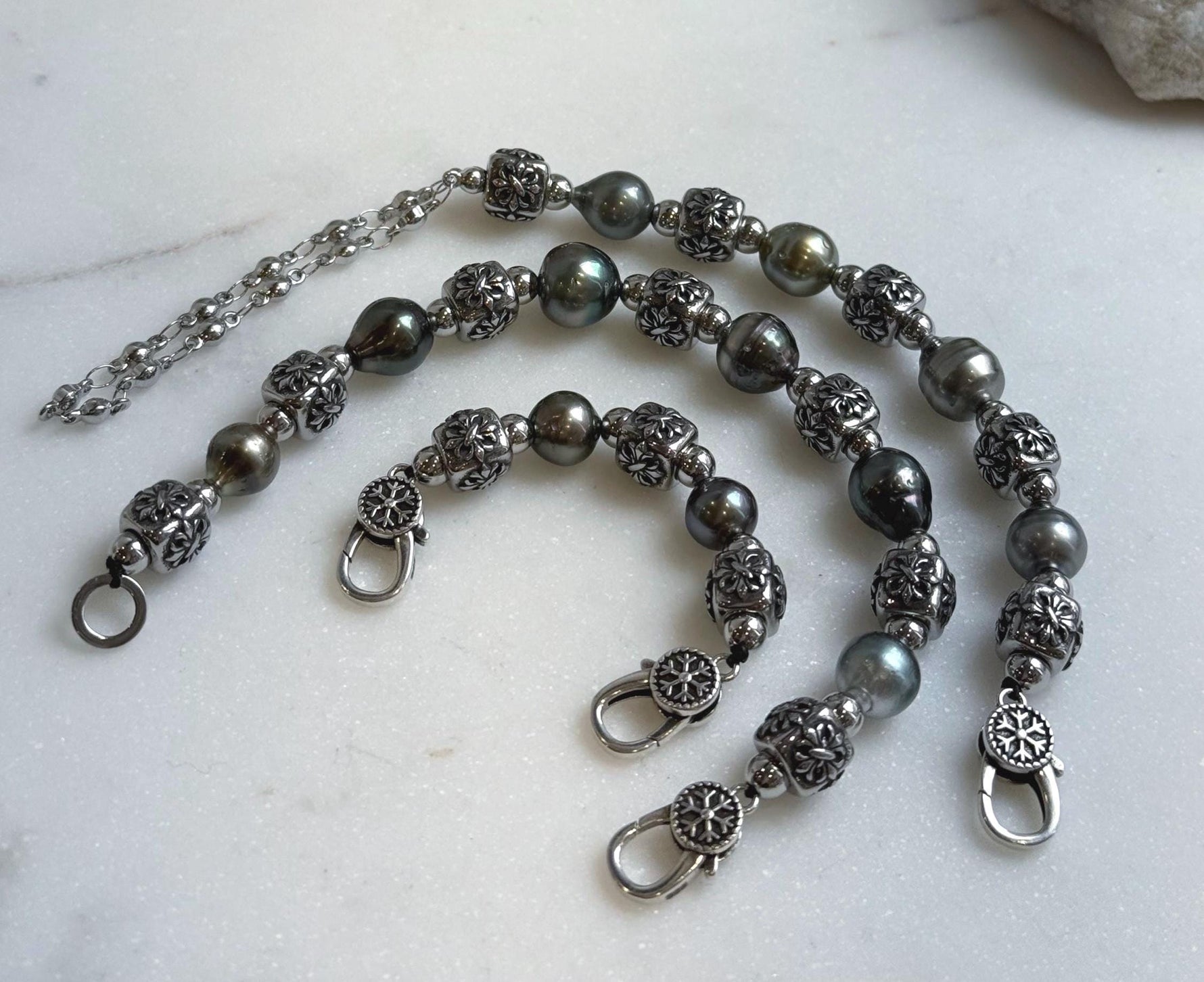 Elly’s 12pcs 8.4-10.6mm cool Tahitian natural peacock ocean pearls necklace strand: extreme luster, 18.7”, S925 silver necklace or bracelet.
