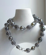 Elly’s 12pcs 8.4-10.6mm cool Tahitian natural peacock ocean pearls necklace strand: extreme luster, 18.7”, S925 silver necklace or bracelet.