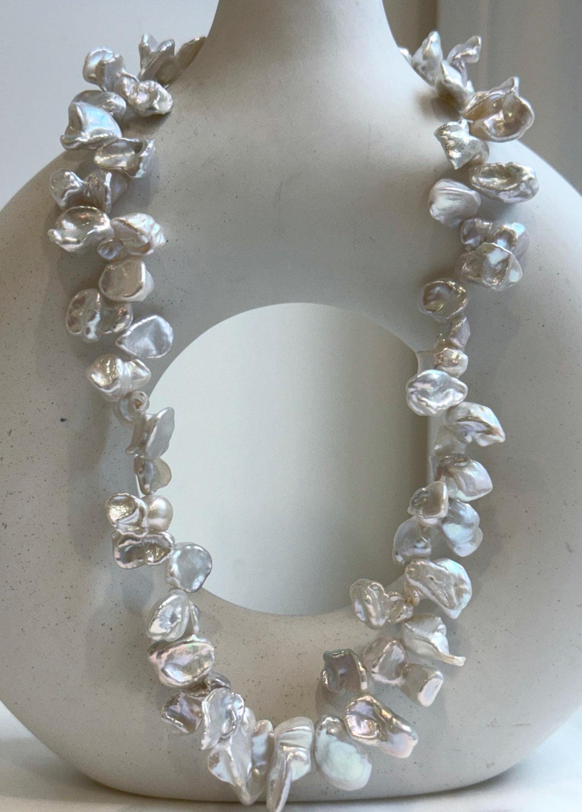 Elly’s Keshi petal white blue iridescent pearls necklace choker: Extreme luster, to 19.1”.