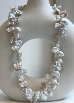 Elly’s Keshi petal white blue iridescent pearls necklace choker: Extreme luster, to 19.1”.