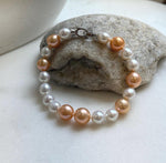 Elly’s 19pcs 8-10.2mm Natural Sunset peach gold White Edison Pearls Bracelet: Extreme luster mirrored, 8” knotted, S925 silver Bracelet. daily office colored pearls bracelet