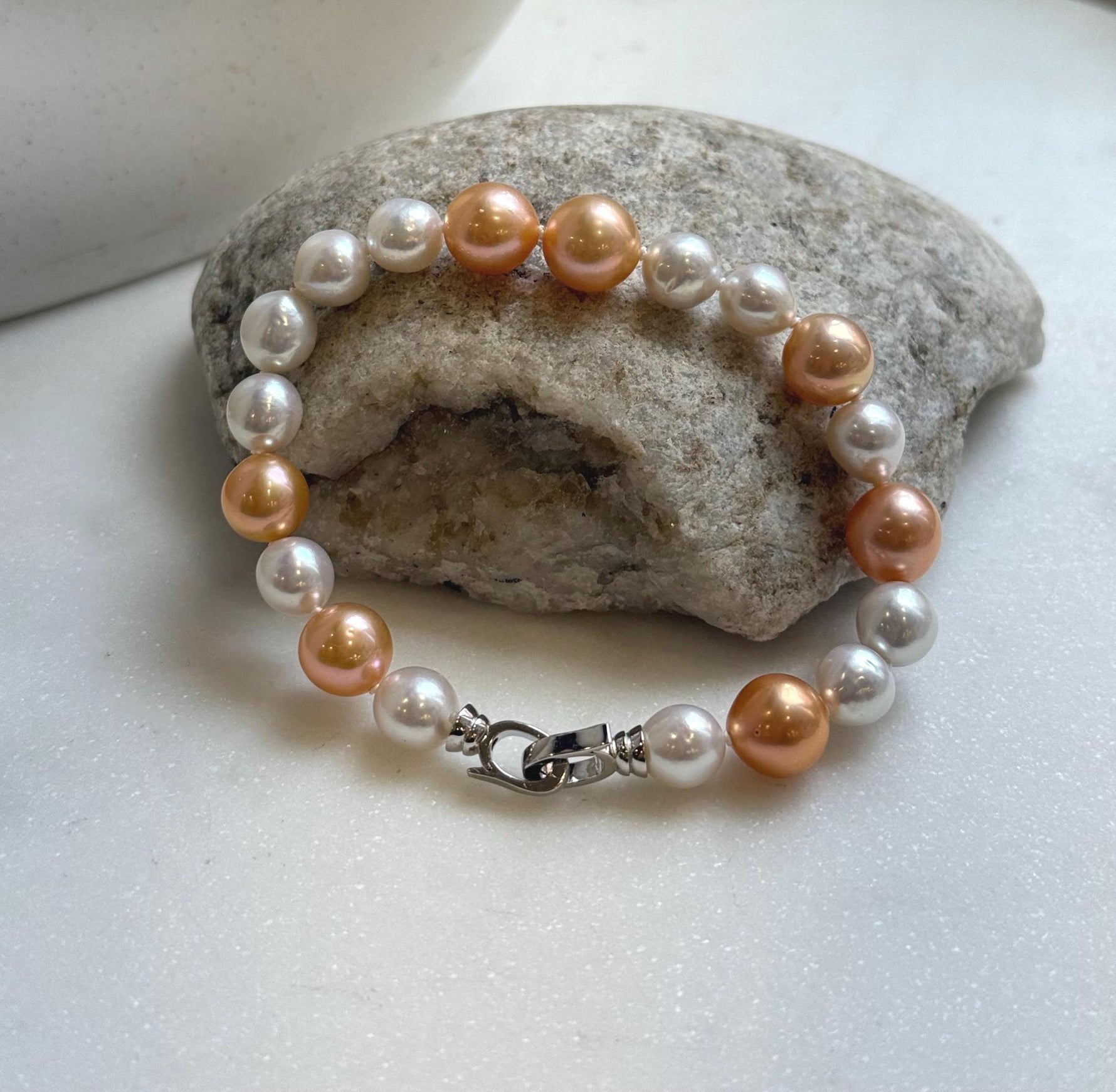 Elly’s 19pcs 8-10.2mm Natural Sunset peach gold White Edison Pearls Bracelet: Extreme luster mirrored, 8” knotted, S925 silver Bracelet. daily office colored pearls bracelet