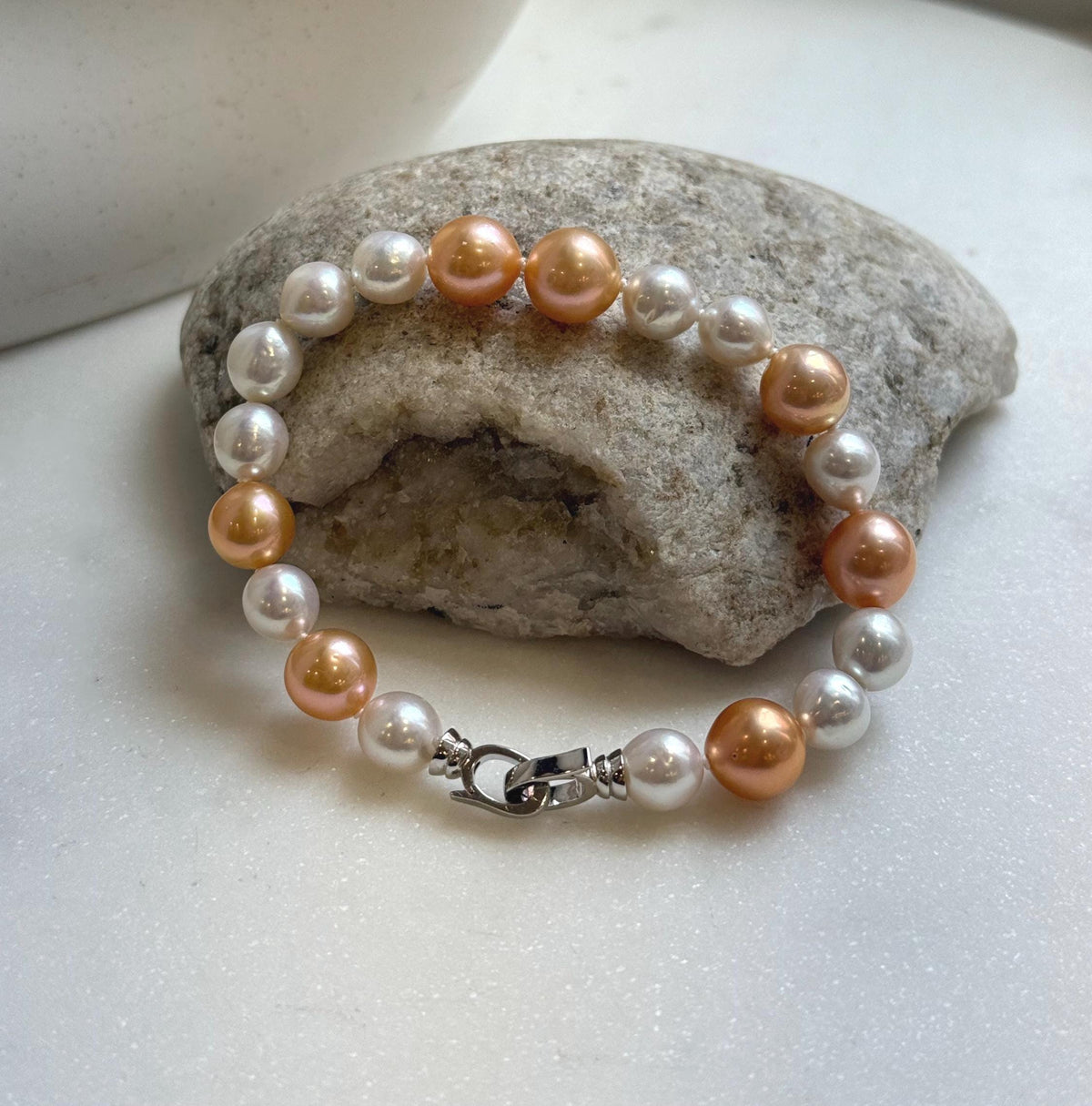 Elly’s 19pcs 8-10.2mm Natural Sunset peach gold White Edison Pearls Bracelet: Extreme luster mirrored, 8” knotted, S925 silver Bracelet. daily office colored pearls bracelet