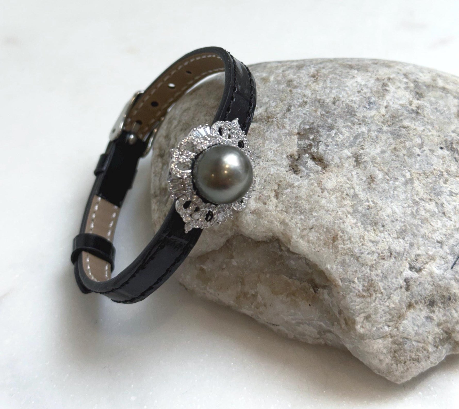Elly’s 11.7mm Tahitian Platinum Ocean Pearl Genius Leather Strap Bracelet: Extreme luster mirrored, for 6.1”- 8” wrist.