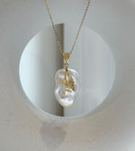 Elly’s Insale White Iridescent baroque pearl Pendant: Extreme luster, 19.4x27mm, 4cm high, S925 silver butterfly pendant.