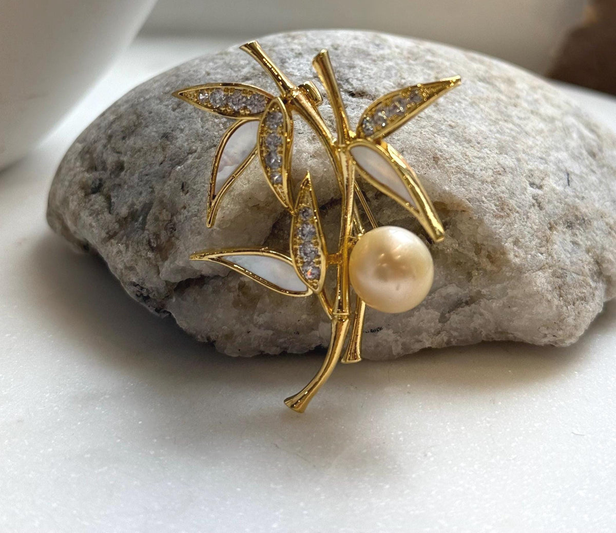 Elly’s south sea golden ocean pearl Bamboo brooch: Extreme luster mirrored, 11mm.
