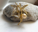 Elly’s south sea golden ocean pearl Bamboo brooch: Extreme luster mirrored, 11mm.