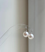 Elly’s 11.1mm Edison white Pearls pink hue Earrings Hooks: Extreme luster Mirrored, 1.8cm high, S925 silver minimalist earrings hooks.