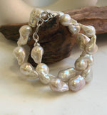 Elly’s 19pcs White Iridescent Baroque Tail pearls necklace strand: Extreme luster mirrored, To 25.2mm. Knotted, 18.5”, S925 silver necklace. high quality baroque pearls necklace for her