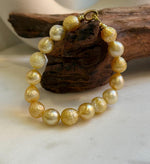 Elly’s 9.7-11mm 16pcs Genius South sea golden Ocean Pearls bracelet: Extreme luster, gold to deep golden pearls, 8.6”, S925 silver bracelet. high quality genius golden ocean pearls gift for her birthday anniversary statement holiday retirement