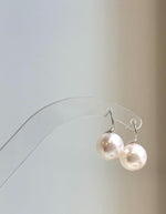 Elly’s 11.1mm Edison white Pearls pink hue Earrings Hooks: Extreme luster Mirrored, 1.8cm high, S925 silver minimalist earrings hooks.
