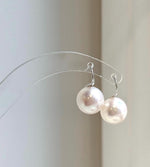 Elly’s 11.1mm Edison white Pearls pink hue Earrings Hooks: Extreme luster Mirrored, 1.8cm high, S925 silver minimalist earrings hooks.