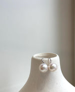 Elly’s 11.1mm Edison white Pearls pink hue Earrings Hooks: Extreme luster Mirrored, 1.8cm high, S925 silver minimalist earrings hooks.