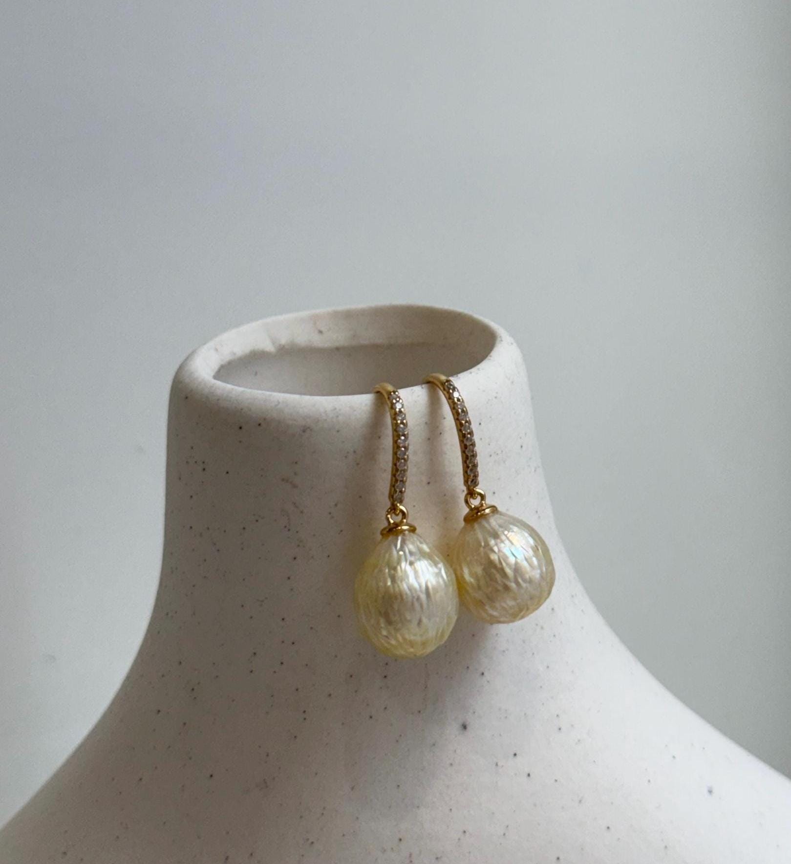 Elly’s 10mm Genius South sea golden carved ocean Pearls Earrings hooks:Extreme luster, 2.4cm high, S925 silver cool earrings.good quality ocean golden pearls earrings hooks for her