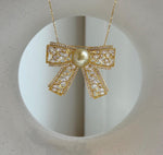 Elly’s South sea ultra gold pearl butterfly bow brooch pendant 2in1: Extreme luster mirrored, 10.5mm, 4x3.2cm.