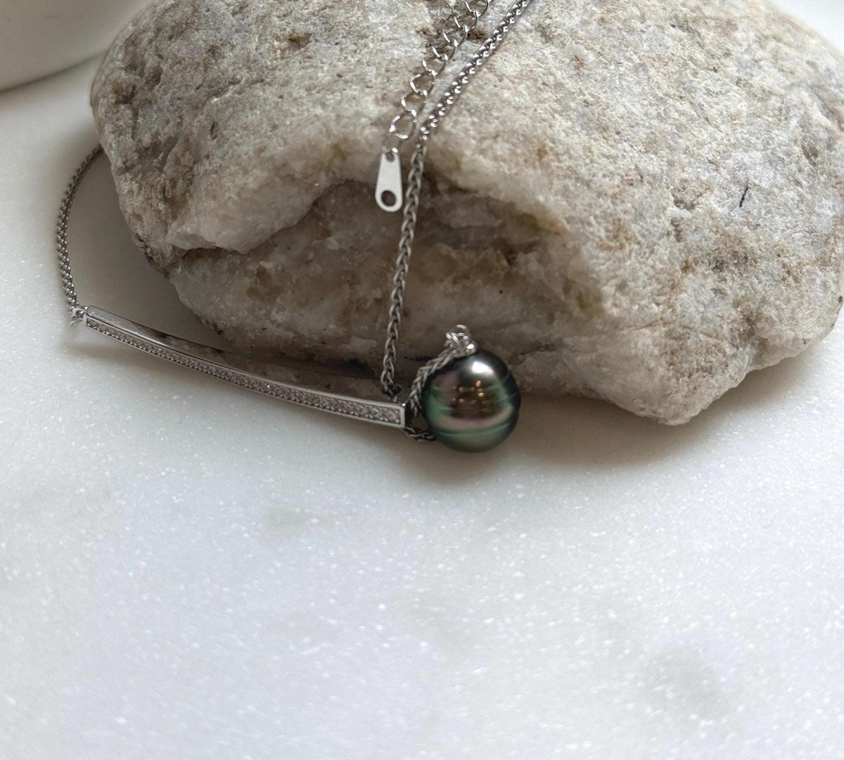 Elly’s 10.2mm Genius Tahitian peacock green ocean pearl Pendant: Extreme luster mirrored, to 20”, s925 silver minimalist pendant chain set.