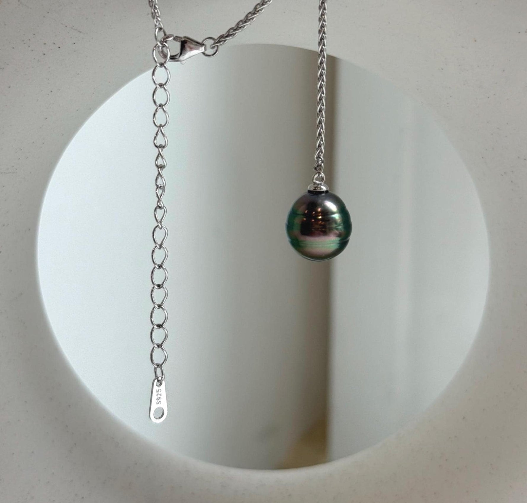 Elly’s 10.2mm Genius Tahitian peacock green ocean pearl Pendant: Extreme luster mirrored, to 20”, s925 silver minimalist pendant chain set.