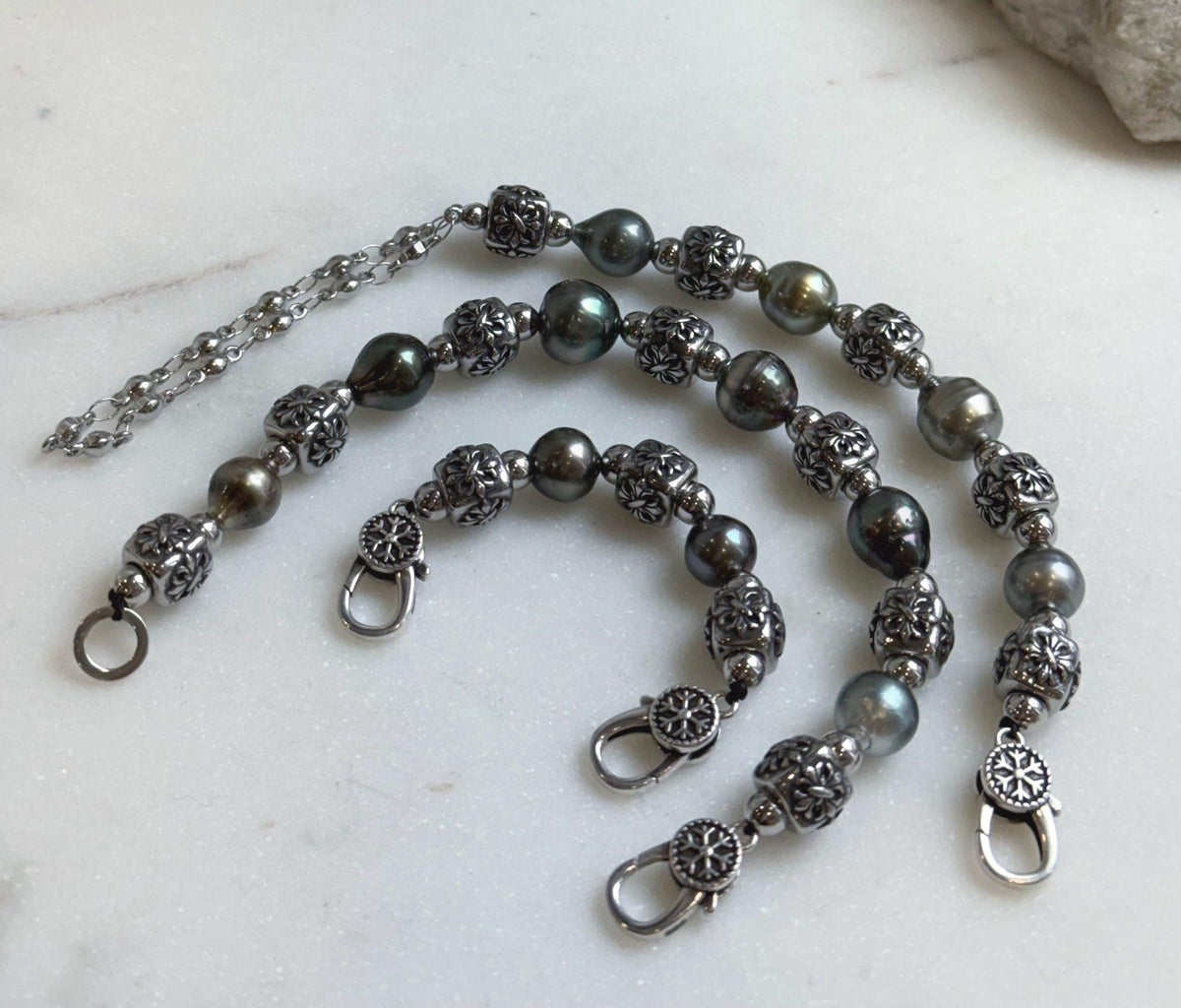 Elly’s 12pcs 8.4-10.6mm cool Tahitian natural peacock ocean pearls necklace strand: extreme luster, 18.7”, S925 silver necklace or bracelet.
