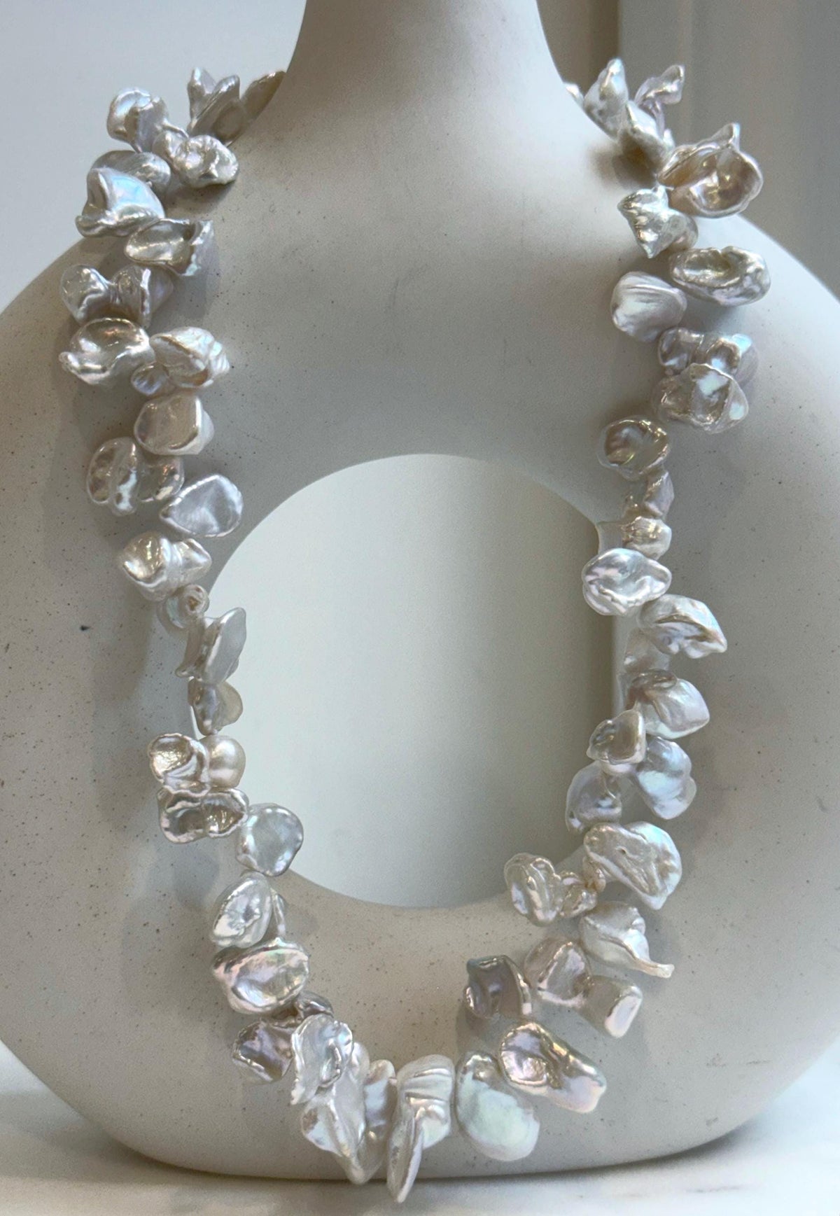 Elly’s large Keshi petal white blue iridescent pearls necklace choker: Extreme luster, 19.1”.