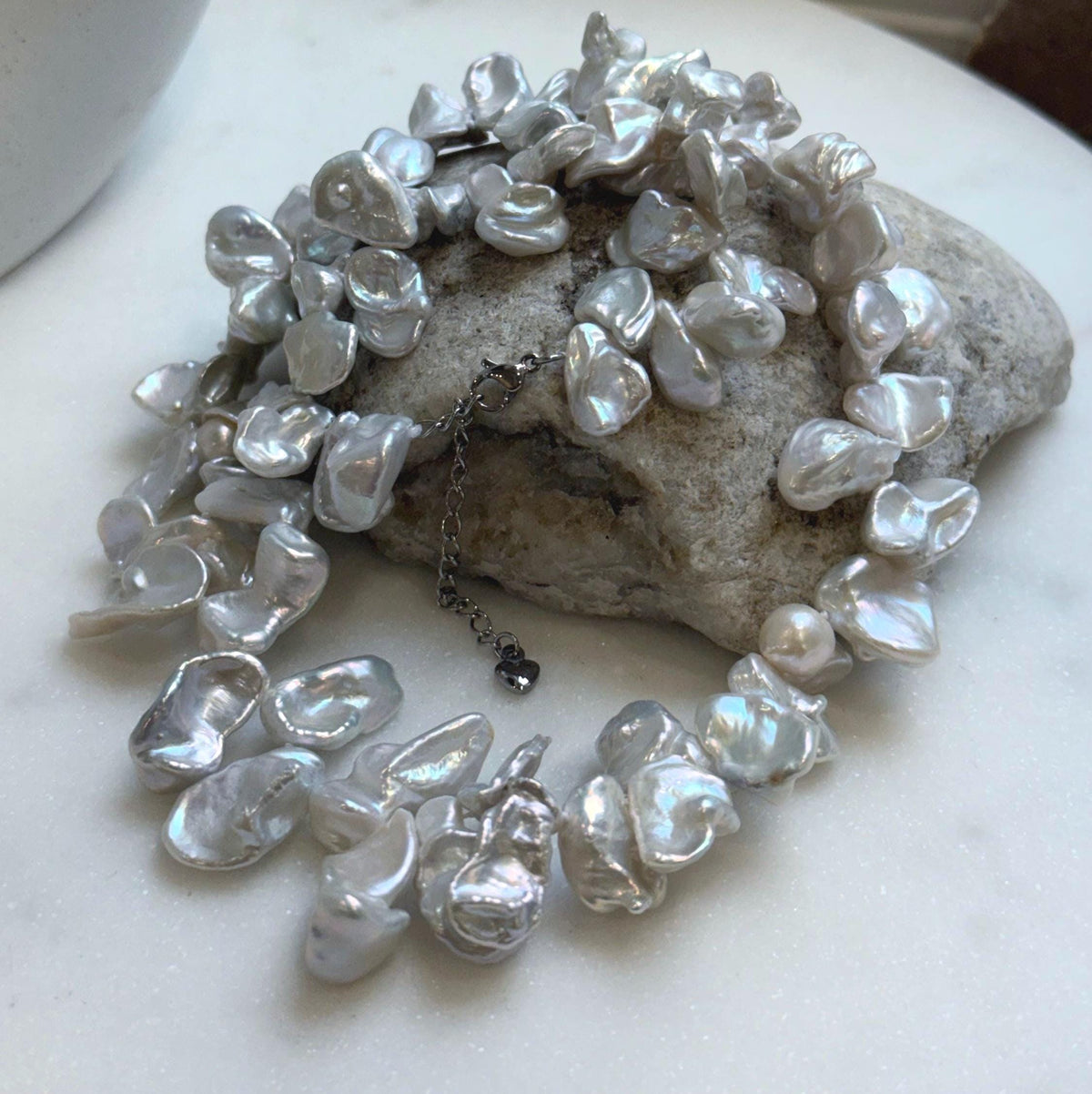 Elly’s large Keshi petal white blue iridescent pearls necklace choker: Extreme luster, 19.1”.