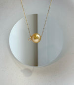 Elly’s Au750 18k Gold 12.8mm South sea deep gold ocean Pearl Floating pendant:Extreme luster mirrored, silver chain.