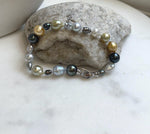 Elly’s Multicolor Ocean Pearls Bracelet: 20pcs South Sea Golden White Tahitian Akoya Pearls, Extreme luster, 3.9-9.4mm, 7.8” knotted, S925 silver bracelet.